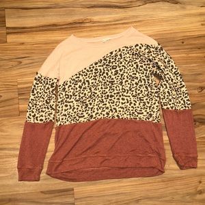 Maurice’s crew neck. Medium in size. Cheetah print and pink.